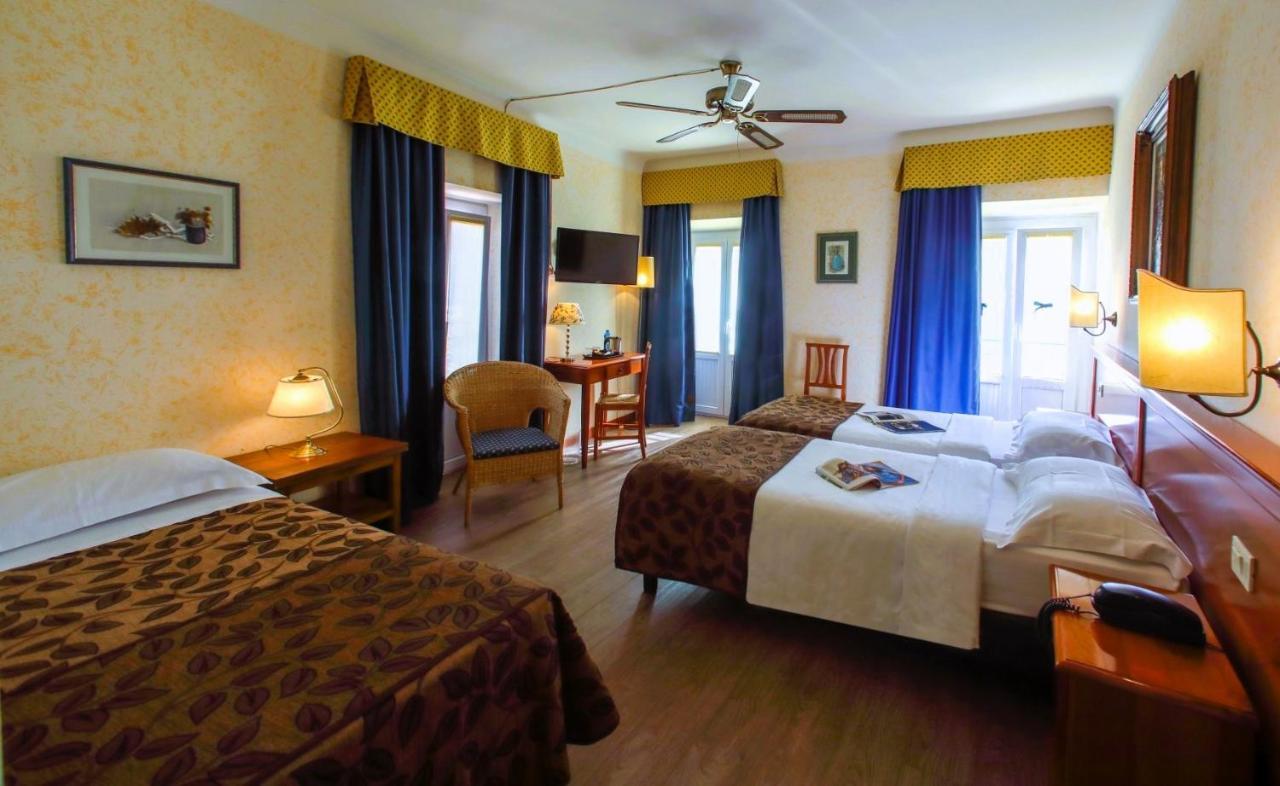 Hotel Garni Riviera Гарньяно Экстерьер фото